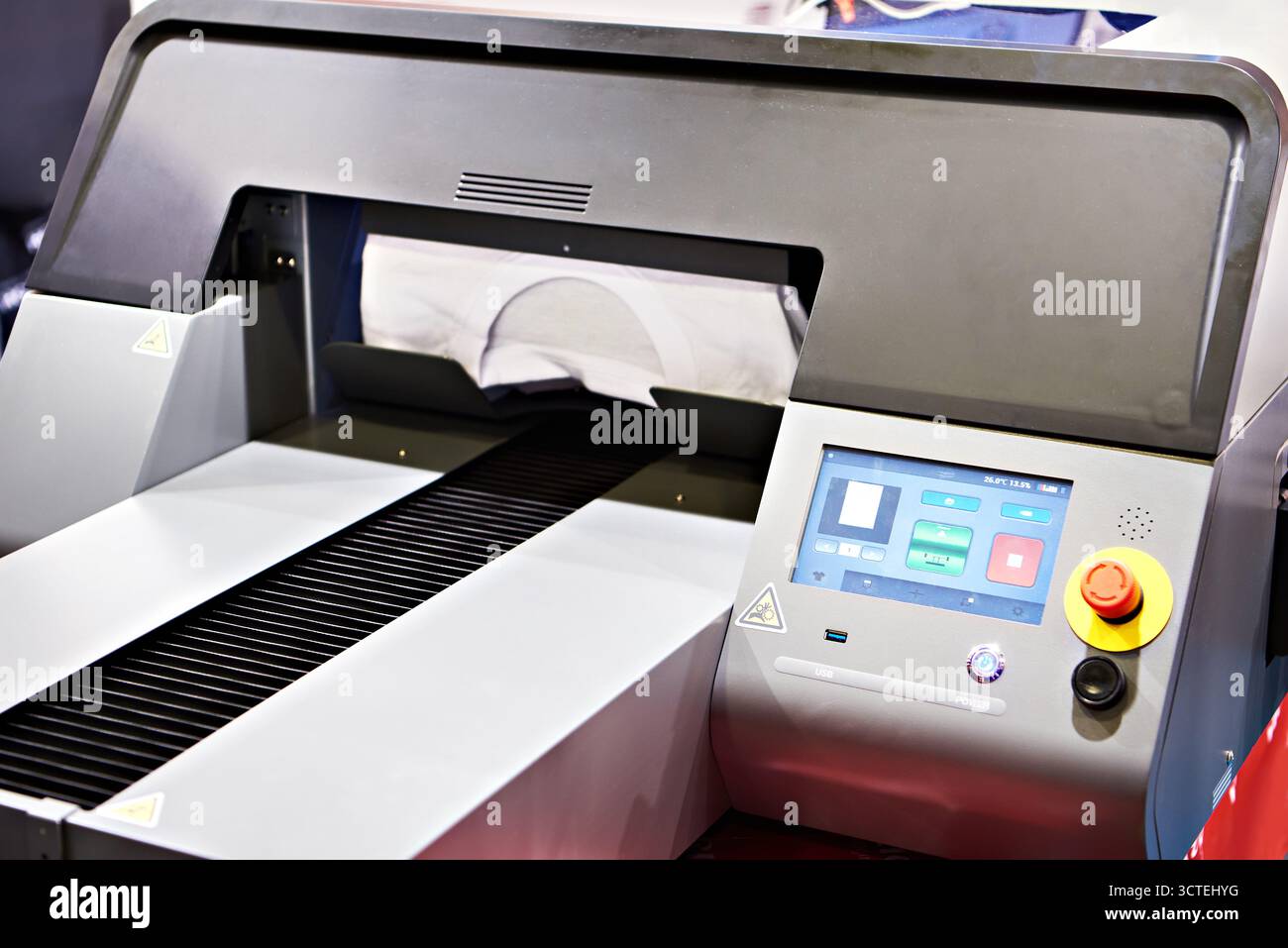 Moderna stampante tessile per abbigliamento e tessuti Foto Stock