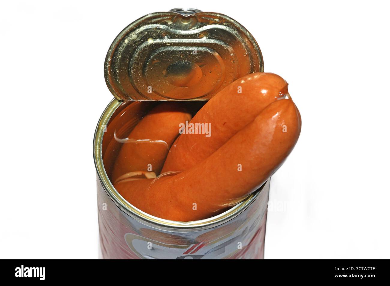 Lebensmittel in Konserven Knackige Würstchen vom Schwein mit Saitling in einer Konservendose *** cibo in scatola salsicce di maiale croccanti con carne di salsiccia in lattina Foto Stock