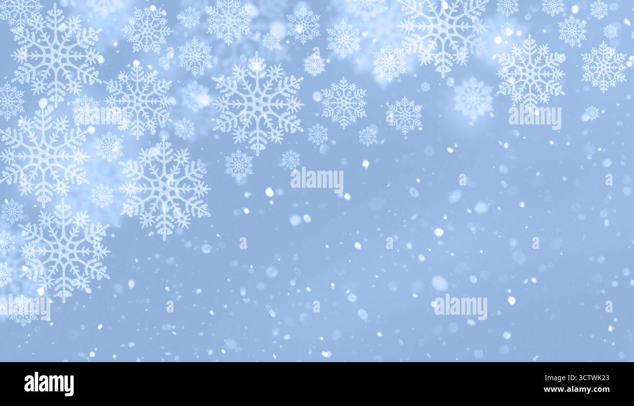 Sfondo blu invernale con motivo a fiocco di neve cadente e atmosfera festosa e tranquilla per immagini di design natalizio Foto Stock