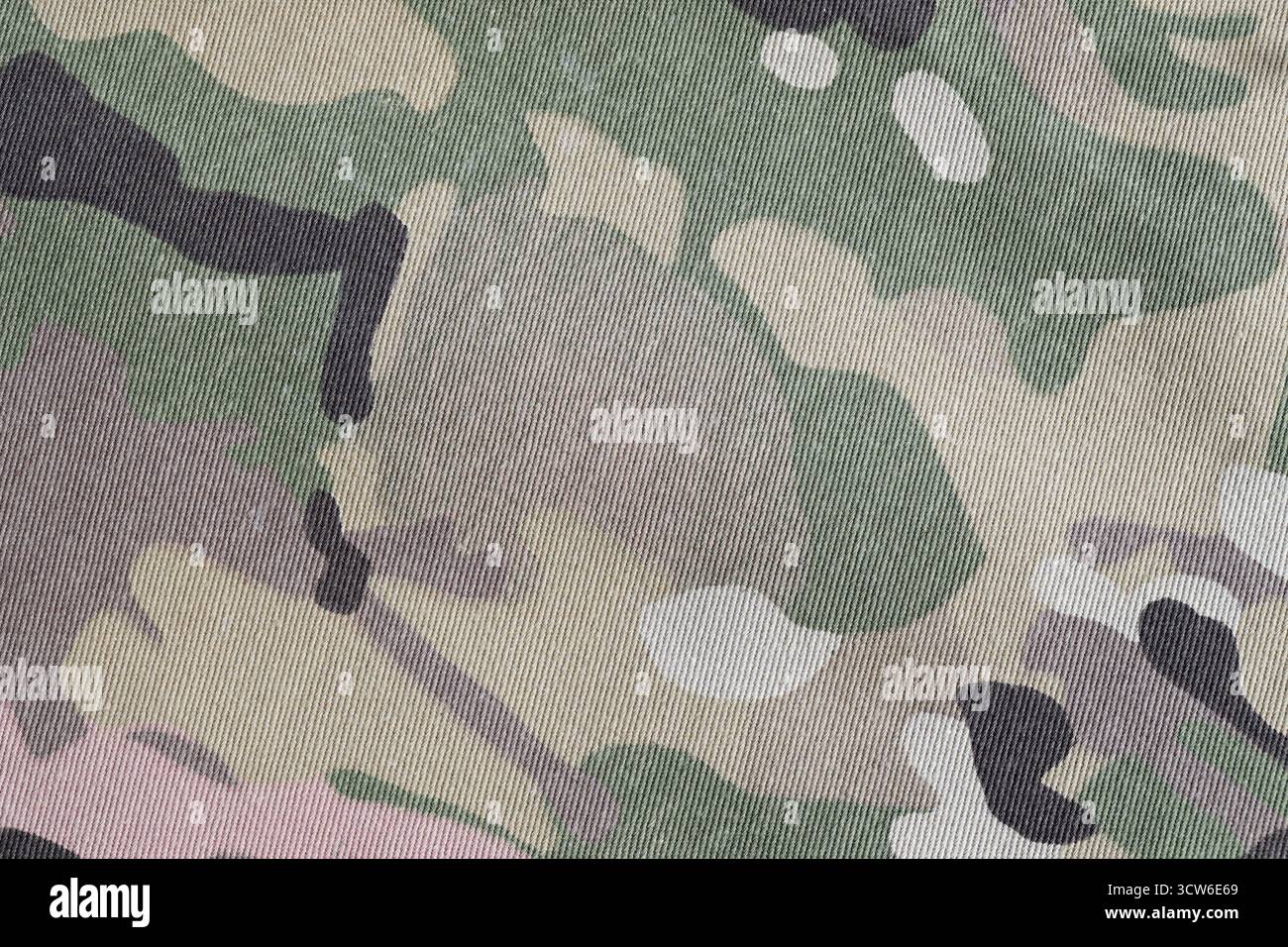 Primo piano con texture in tessuto mimetico multicam a forza armata Foto Stock