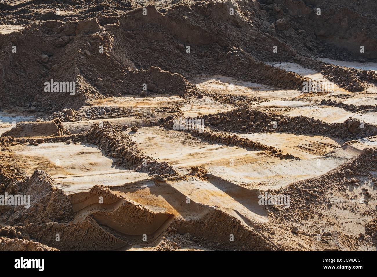 Cantiere pieno di sabbia in una giornata di sole Foto Stock