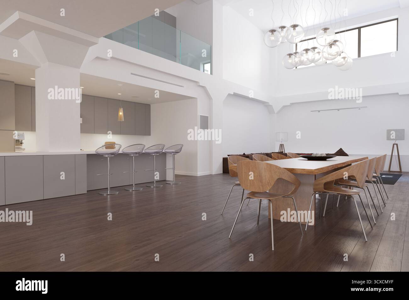 Un'ampia scelta di un moderno appartamento loft open space con zona pranzo e cucina. Lo spazio presenta alti soffitti, un soppalco, pavimenti in legno e Foto Stock
