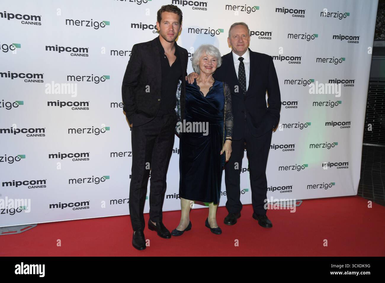 Cannes, Francia. 13 ottobre 2025. Neil Dudgeon, Nick Hendrix e Annette Badland partecipano all'Opening Night Party & Red Carpet durante il Mipcom Cannes a le Majestic. Credito: SOPA Images Limited/Alamy Live News Foto Stock