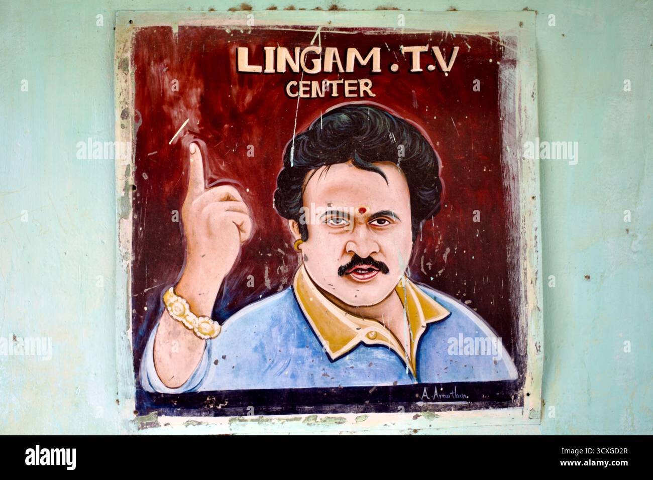 Pubblicità dipinta a mano per il Lingam TV Center con protagonista Rajinikanth, Tiruchirappalli (Trichy), Tamil Nadu, India. Foto Stock