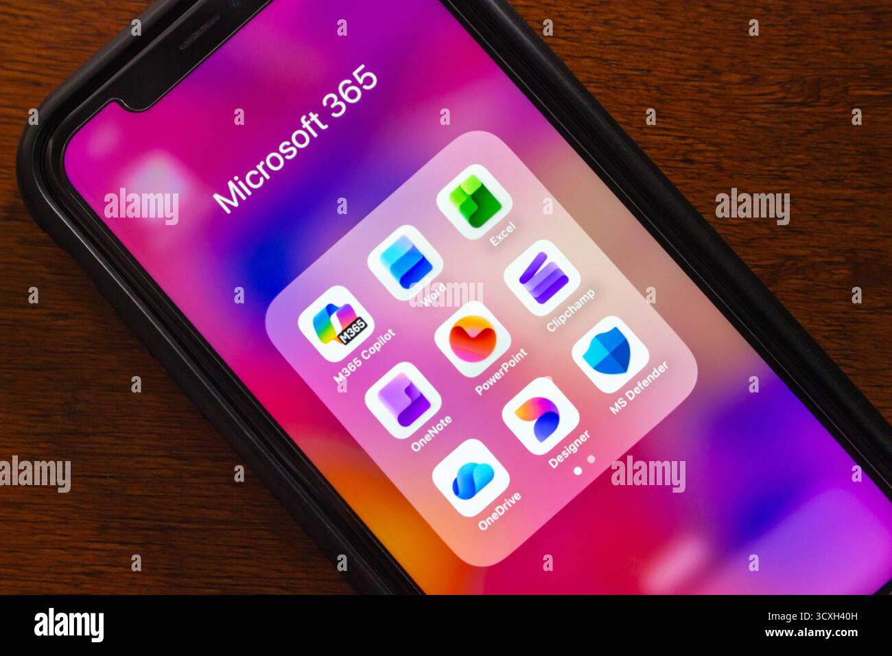 Cartella Microsoft 365 con applicazioni come M365 Copilot, Word, Excel, OneNote, PowerPoint, Clipchamp, OneDrive Microsoft Designer, MS Defender. Foto Stock