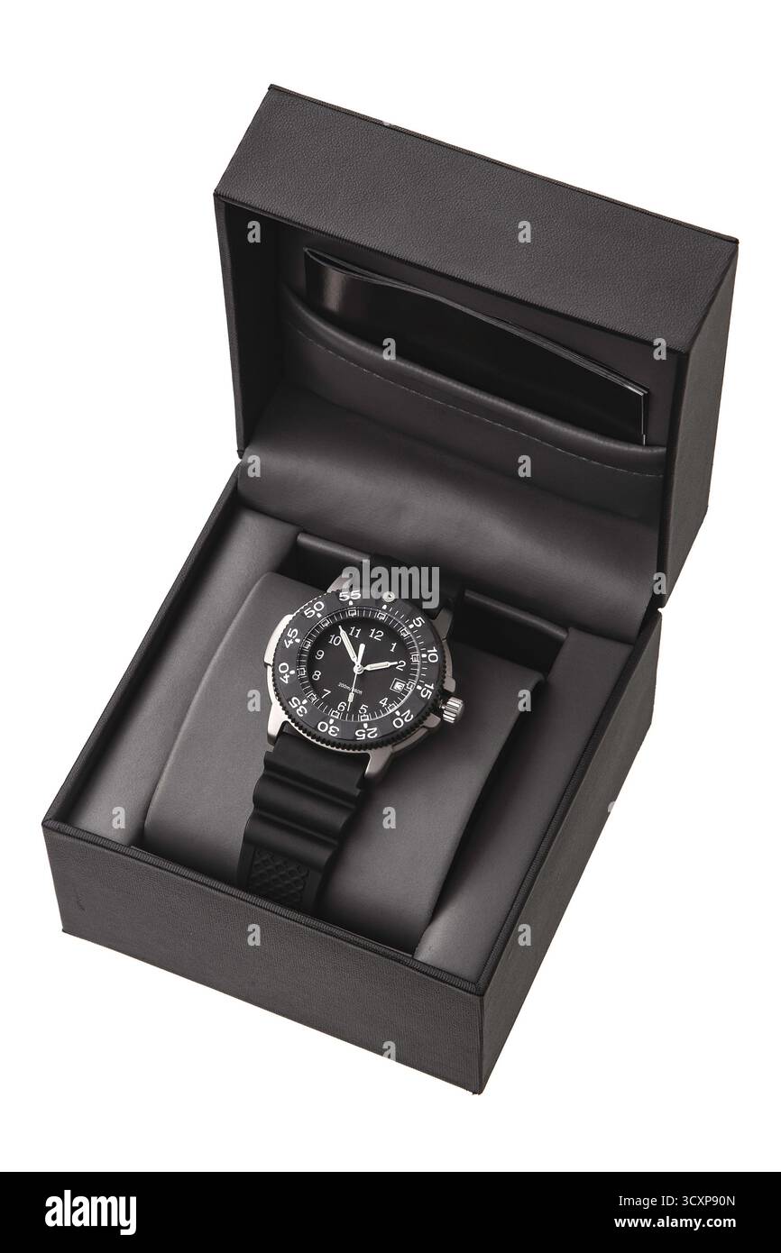 Orologio da immersione nero in stile militare con cinturino in gomma esposto nella scatola aperta. Foto Stock