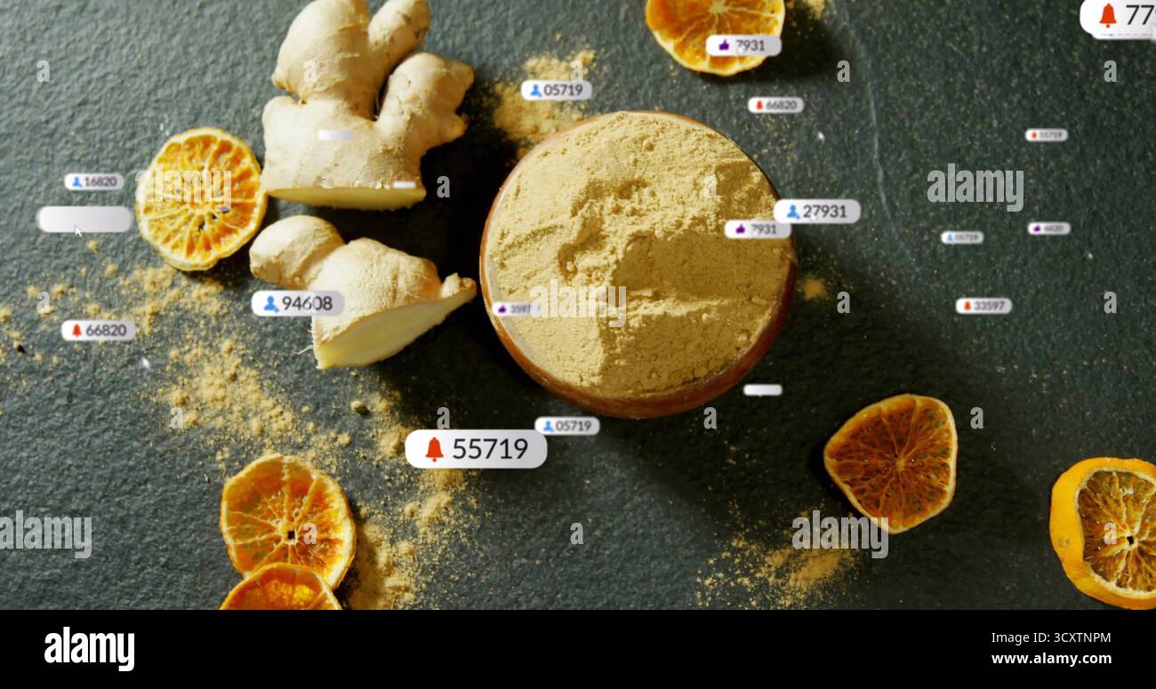 Ciotola di zenzero in polvere seduta in studio con radice di zenzero, agrumi secchi e badge di notifica fluttuanti Foto Stock