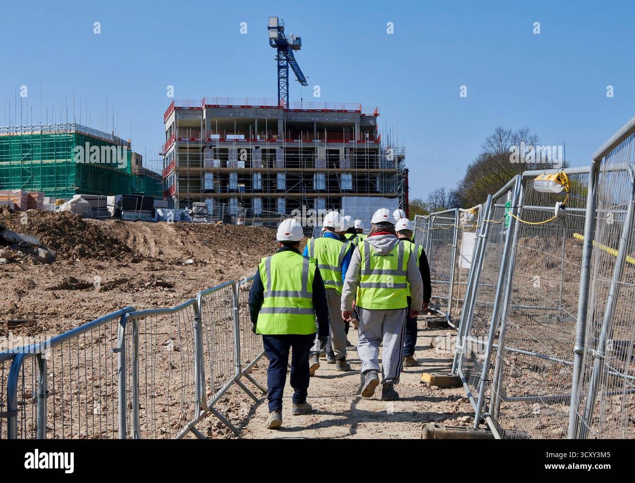 Costruttori al lavoro in un cantiere del Regno Unito a Londra Foto Stock