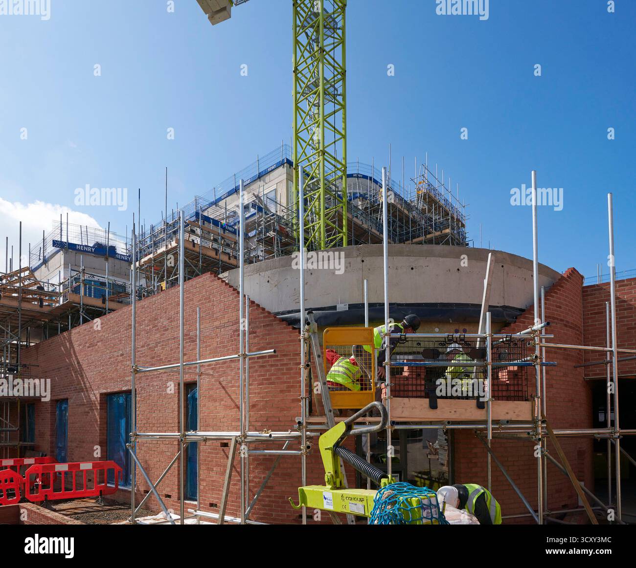 Costruttori al lavoro in un cantiere del Regno Unito a Londra Foto Stock