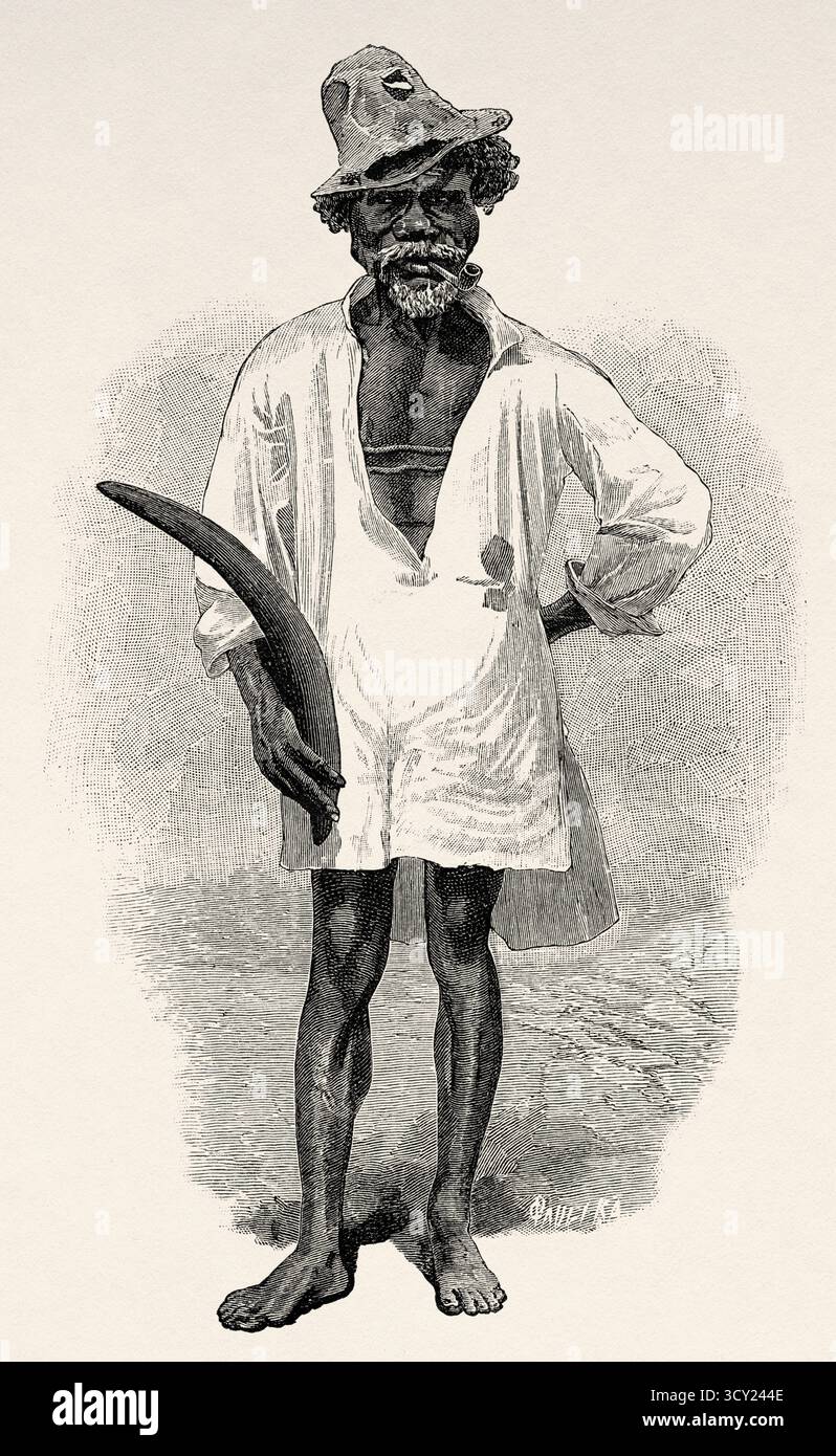 Jacky, un aborigeno australiano nero civilizzato che fuma una pipa e trasporta un boomerang. Australia, Oceania. Nella Terra dei Cannibali. Voyage of Exploration Among the Natives of Eastern Australia, 1880-1884 di Carl Lumholtz (1851-1922) le Tour du Monde del 1888 Foto Stock