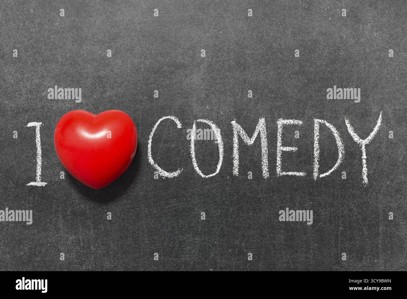 Io amo la commedia una frase scritta a mano sulla scuola di Blackboard Foto Stock