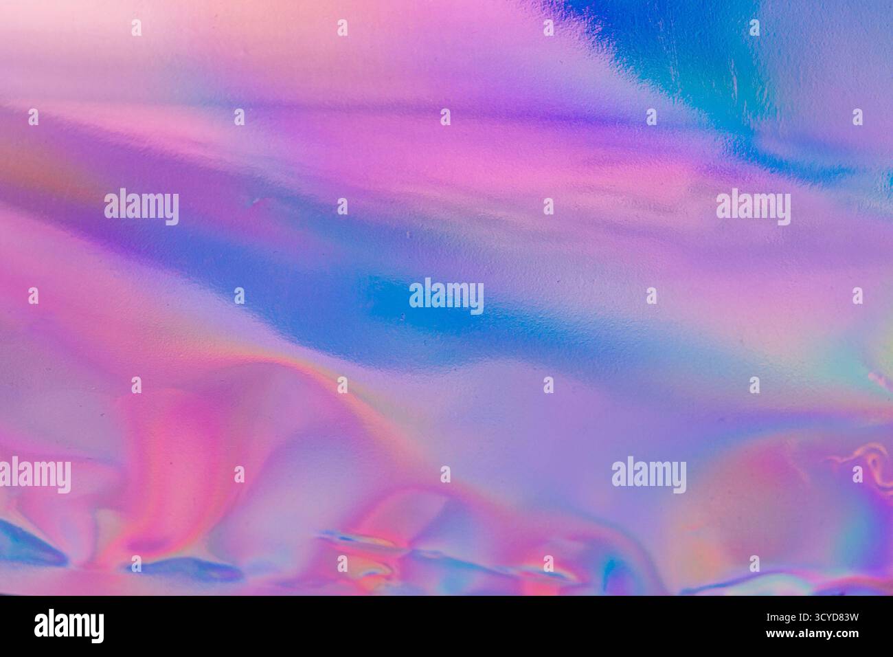 Un'immagine astratta con una transizione fluida di colori viola e rosa, adatta per campagne di marketing creative che evocano l'evoluzione e la miscelazione di conc Foto Stock