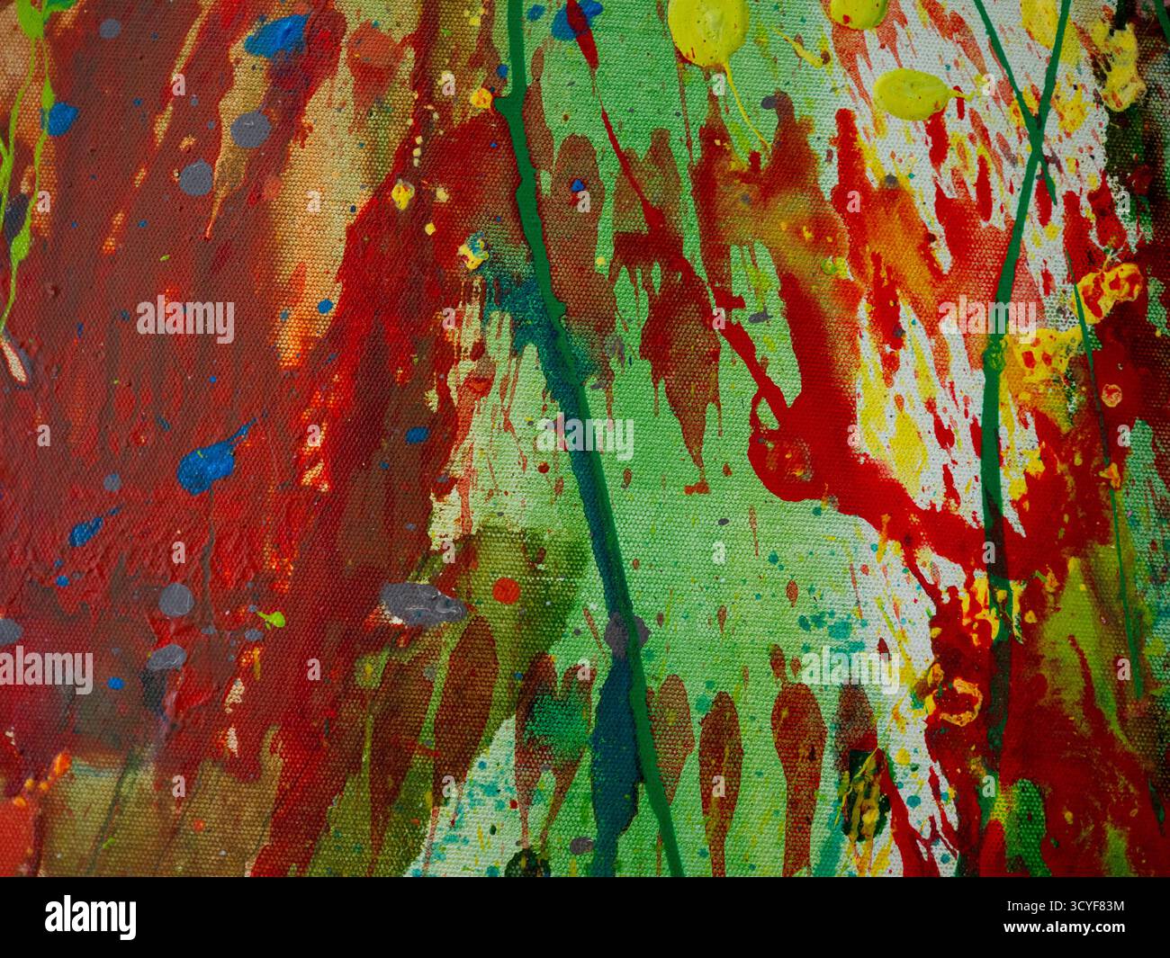 Astratto di colori vivaci sparsi sulla tela Foto Stock