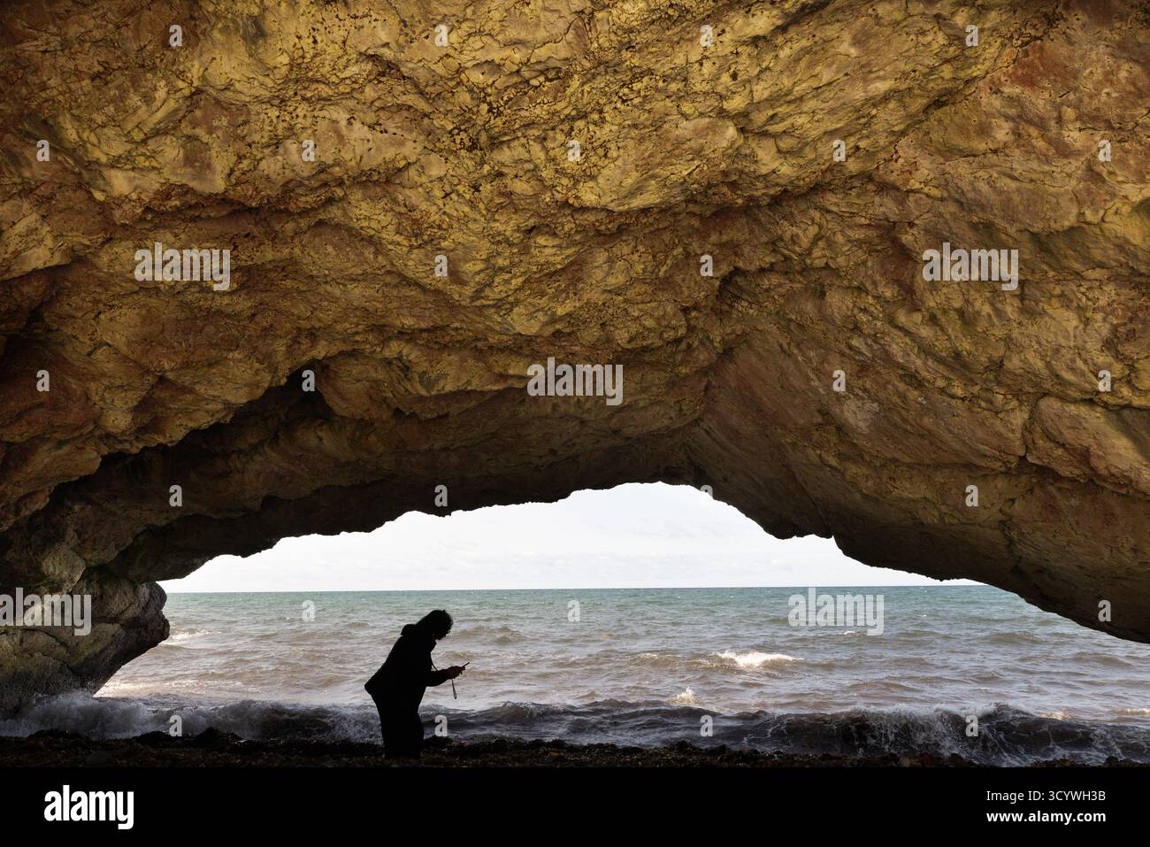 Sea Cave silhouette Gros Morne National Park, Terranova, Canada Foto Stock