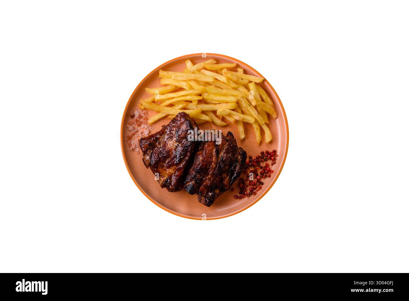 Costolette di maiale grigliate o grigliate con salsa. Costolette grigliate come sfondo per il tuo design. Foto Stock