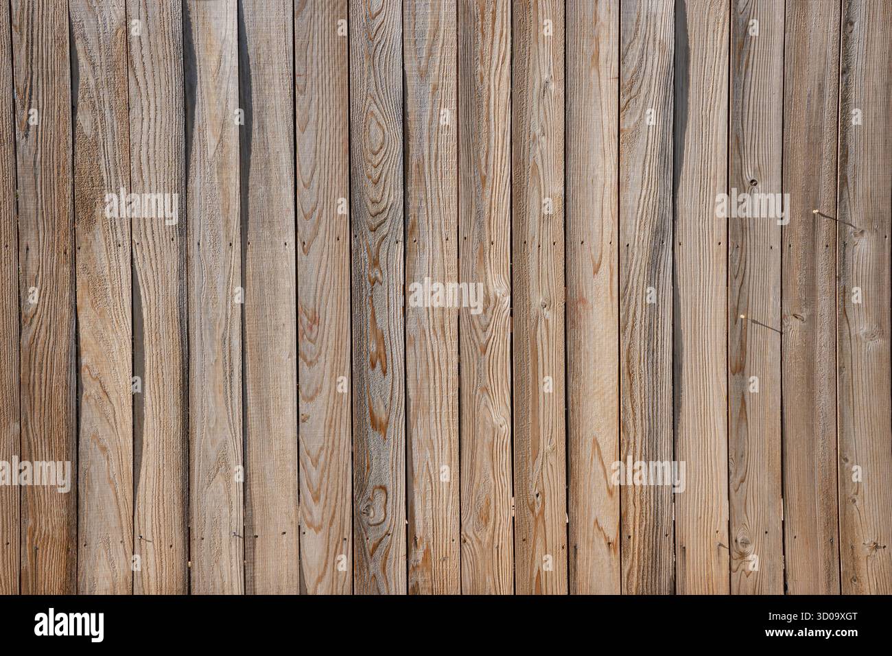 Recinzione in legno marrone con strisce verticali - trama di sfondo rustica Foto Stock