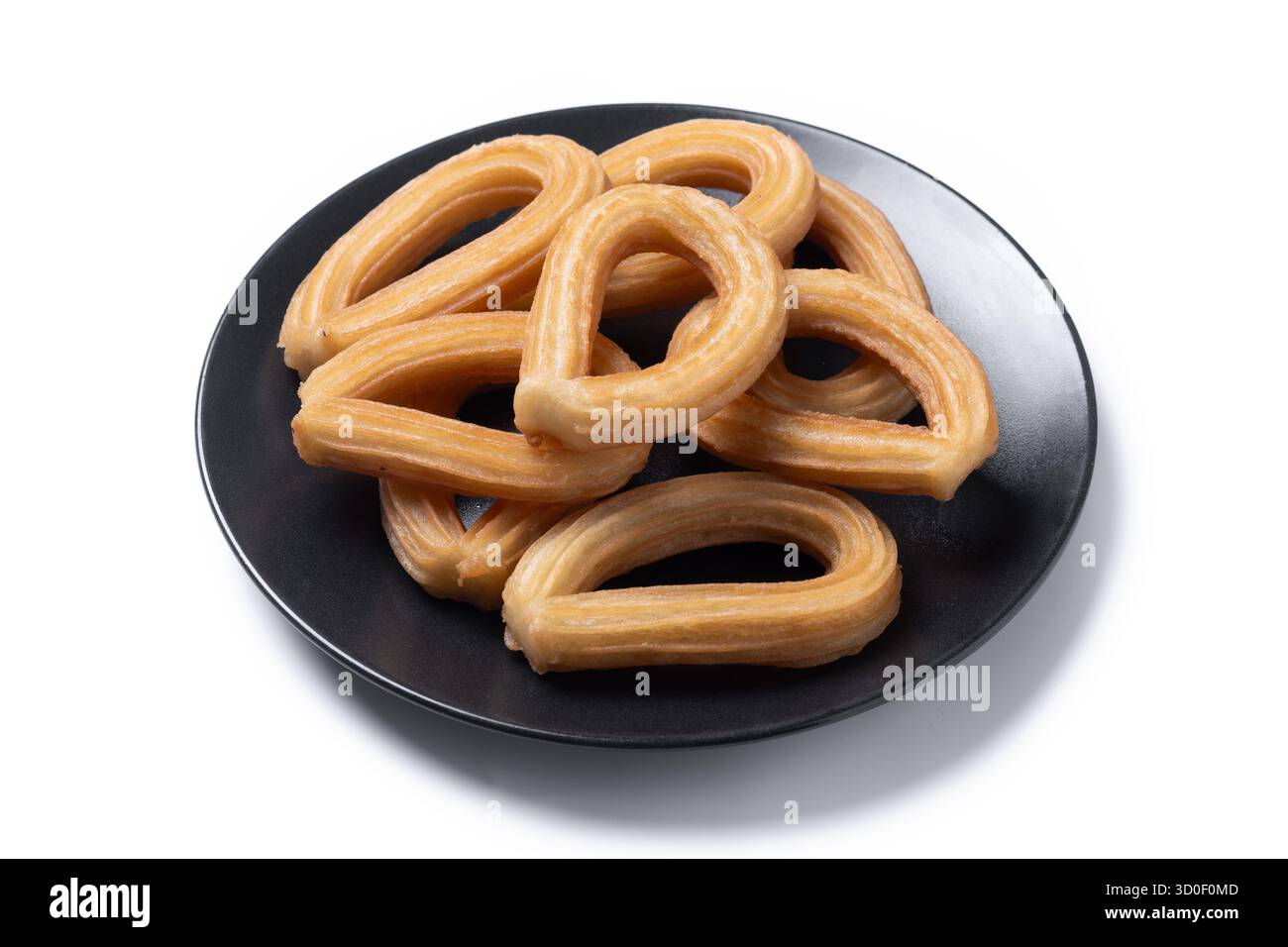 Churros spagnoli tradizionali isolati su sfondo bianco Foto Stock