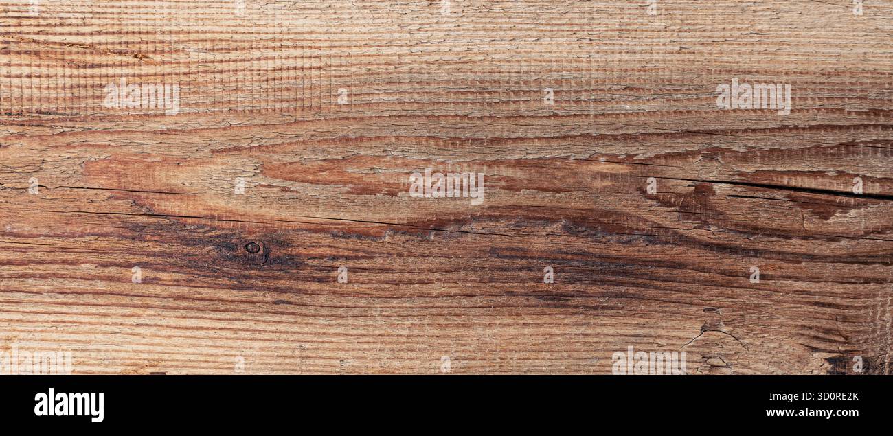 Superficie rustica in legno che mostra grana invecchiata, fornendo un elemento di sfondo naturale Foto Stock