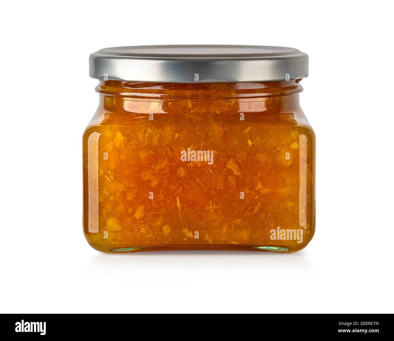 La marmellata d'arancia riempie un vaso di vetro chiuso, preservando i sapori dolci della frutta Foto Stock