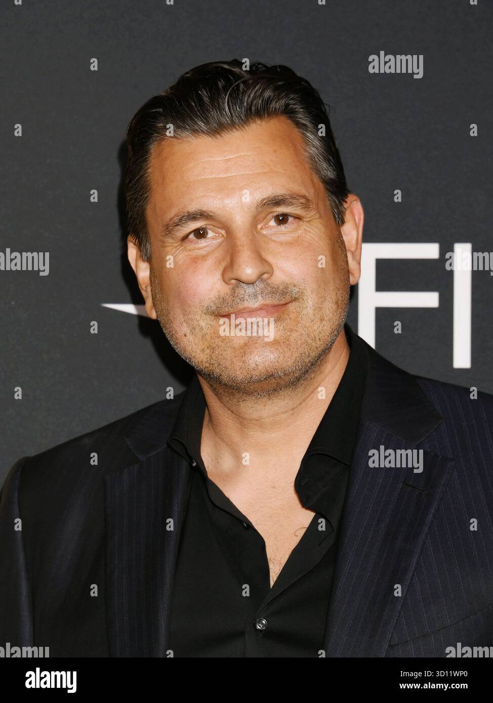 HOLLYWOOD, CALIFORNIA - 24 OTTOBRE: Benjamin Tappan all'AFI FEST 2025 presentato da Canva "Norimberga" Screening al TCL Chinese 6 Theatres il prossimo ottobre Foto Stock