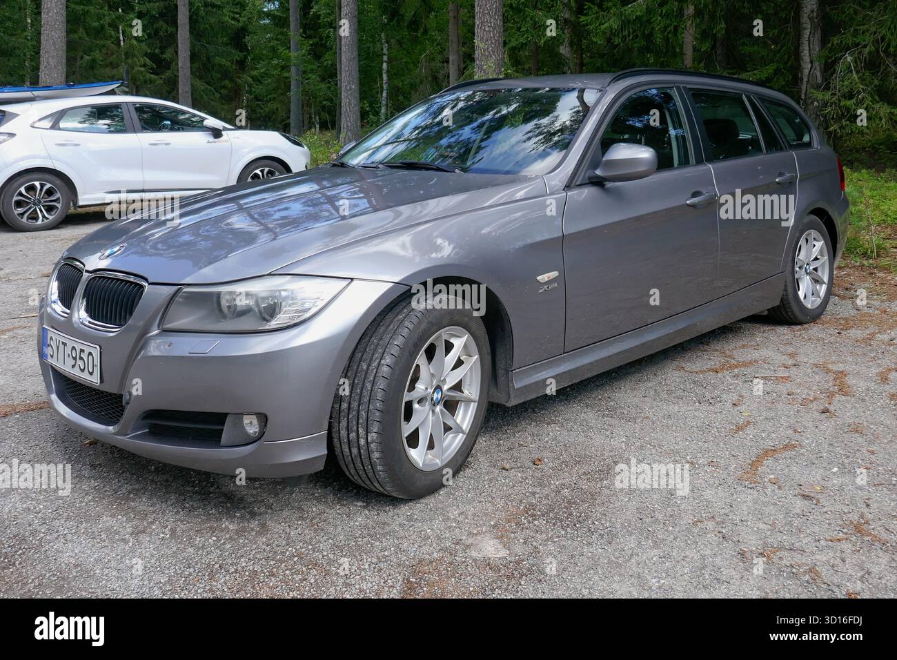 Lappohja, Hanko, Finlandia - 2 agosto. 2025: BMW 3 Touring 320d xDrive (2011) parcheggiata. Foto Stock