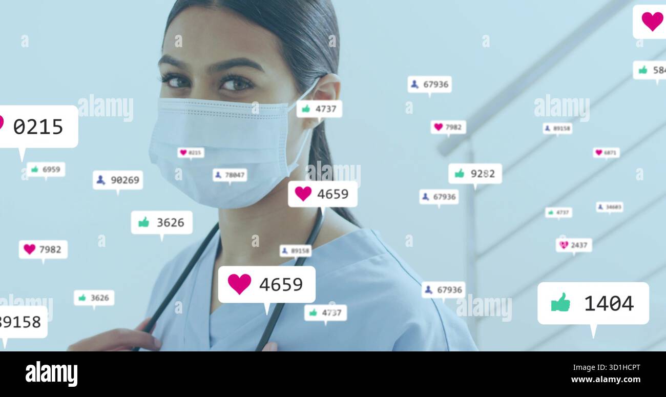 Maschera professionale in piedi, scrub blu con stetoscopio in studio, con icone dei social media Foto Stock