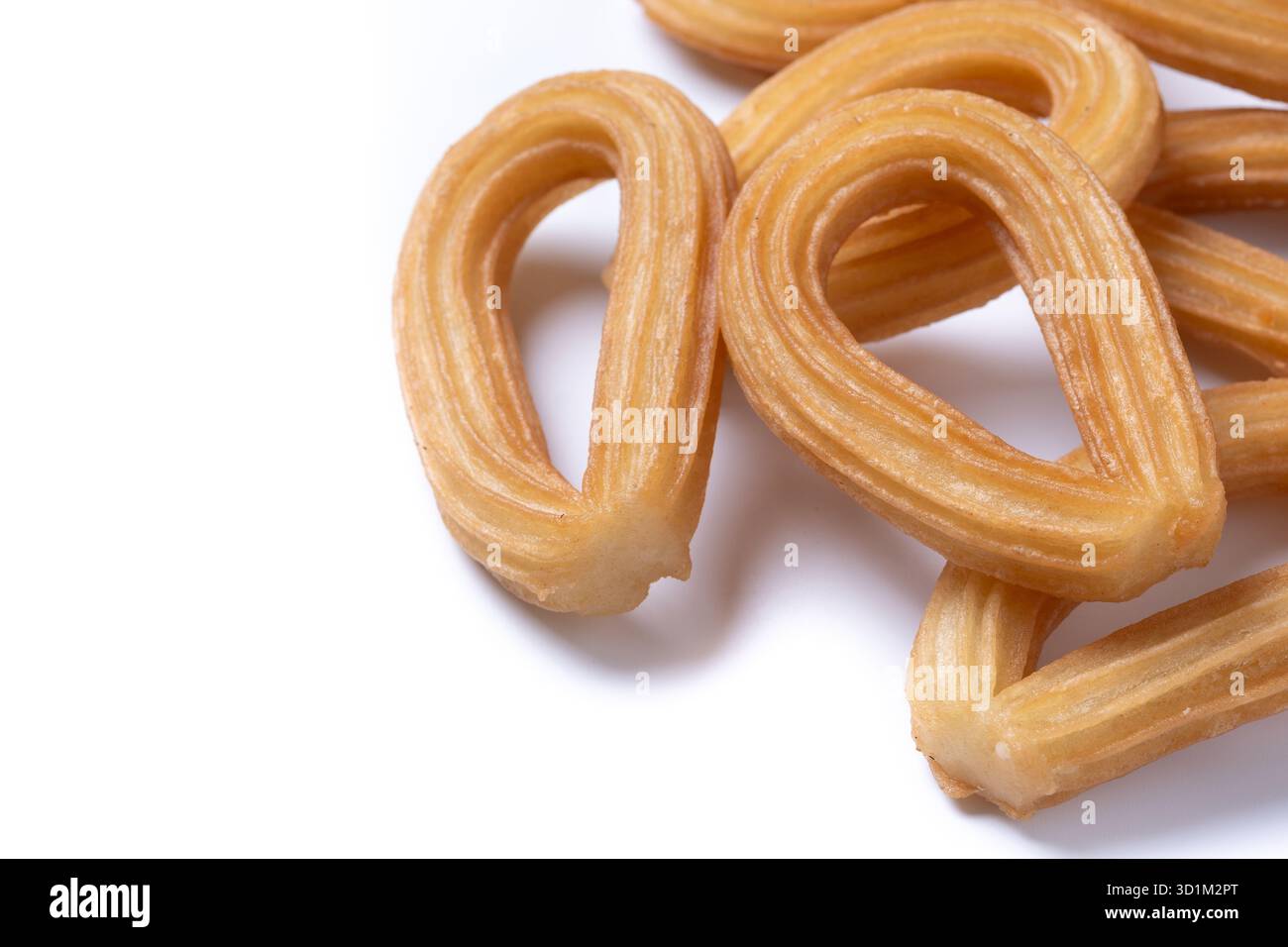 Churros spagnoli tradizionali isolati su sfondo bianco Foto Stock