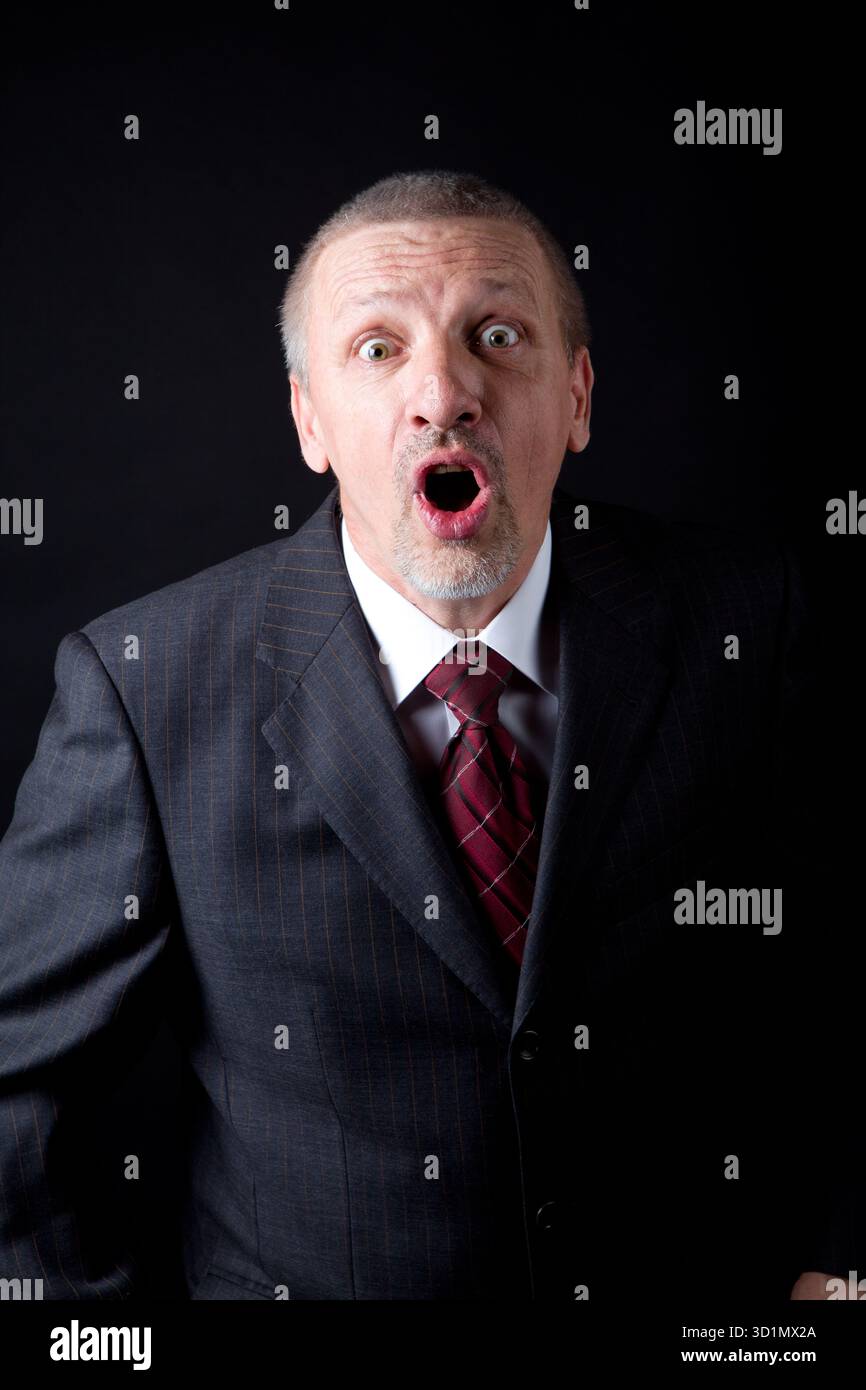 Emotional uomo maturo urlando Foto Stock