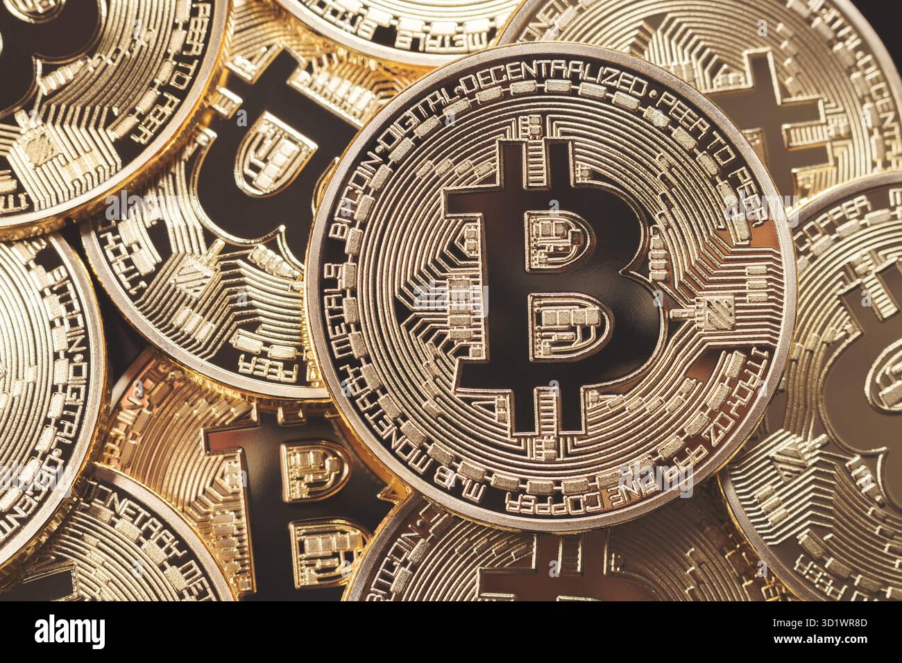 Golden Bitcoins. Nuovo denaro virtuale. Foto Stock