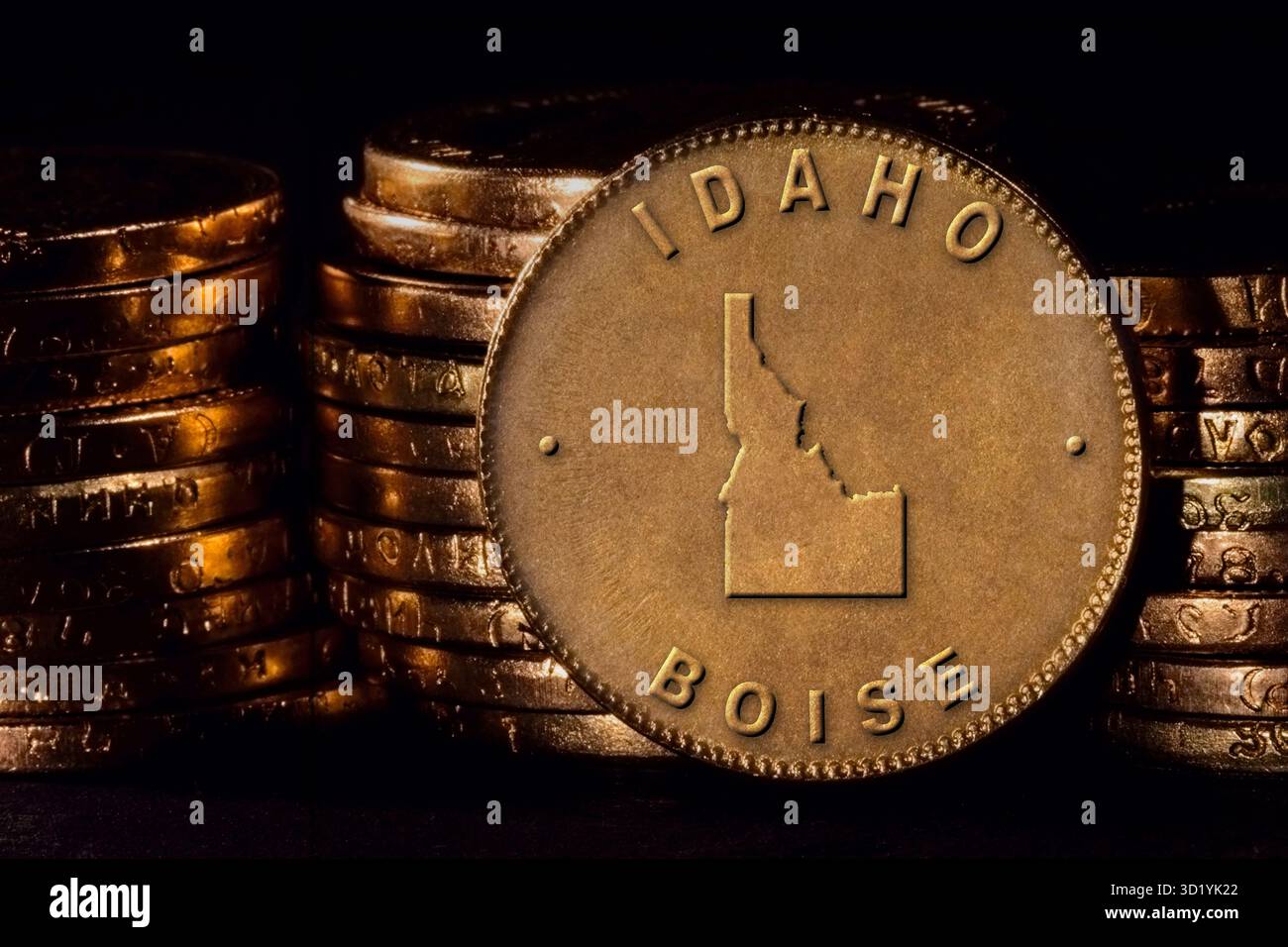 Golden Coin con cartina dell'Idaho Foto Stock