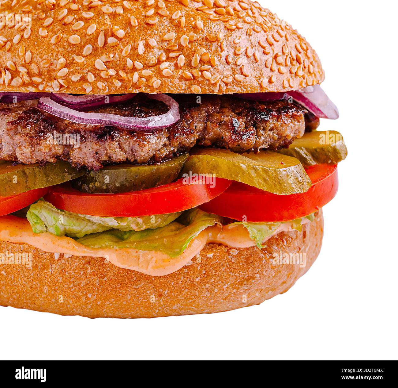 Delizioso hamburger con semi di sesamo con condimenti freschi e succose polpette Foto Stock