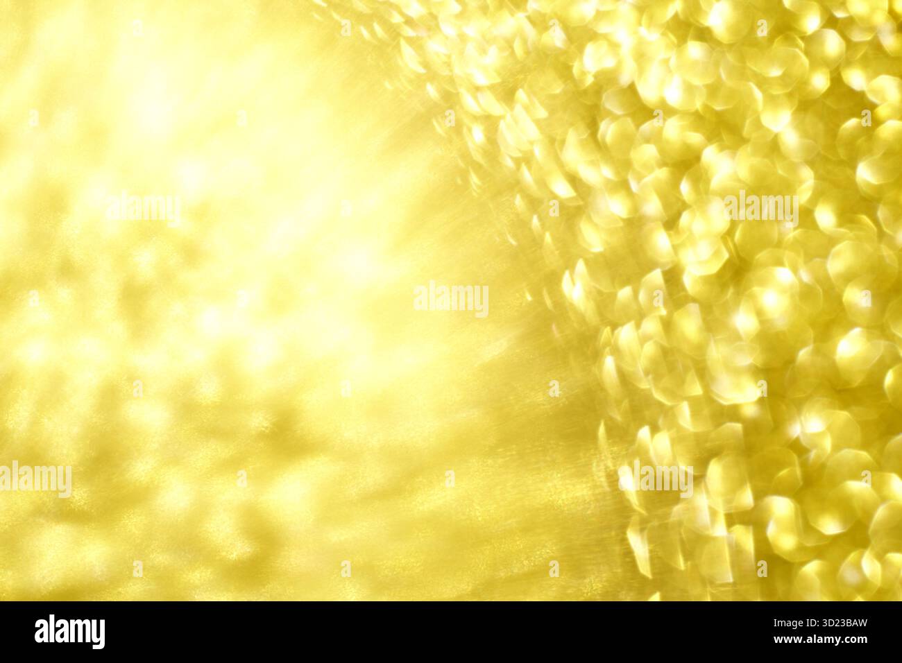 Giallo astratto e oro, con un soffice bokeh e un luminoso splendore Foto Stock