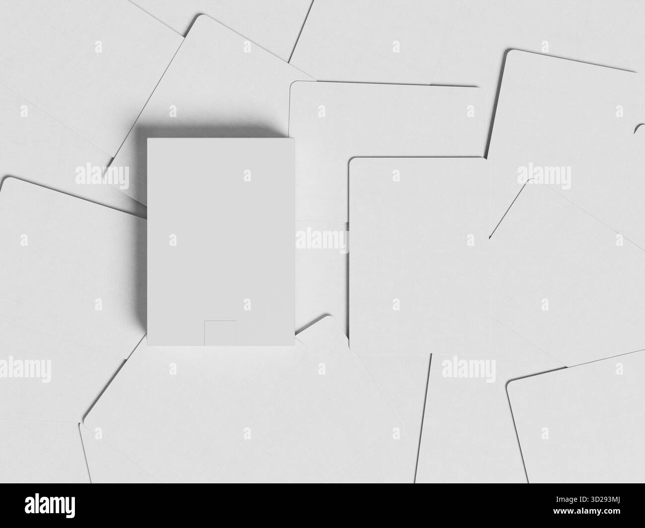 Mazzuolo di carte premium e carte posizionate su uno sfondo di carte sparse Foto Stock
