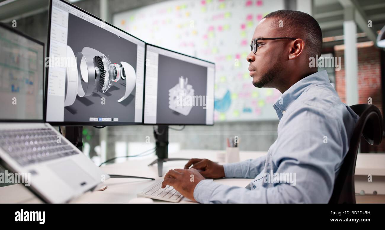 L'uomo afro-americano sviluppa il modello Jet Engine sullo schermo del laptop. Foto Stock