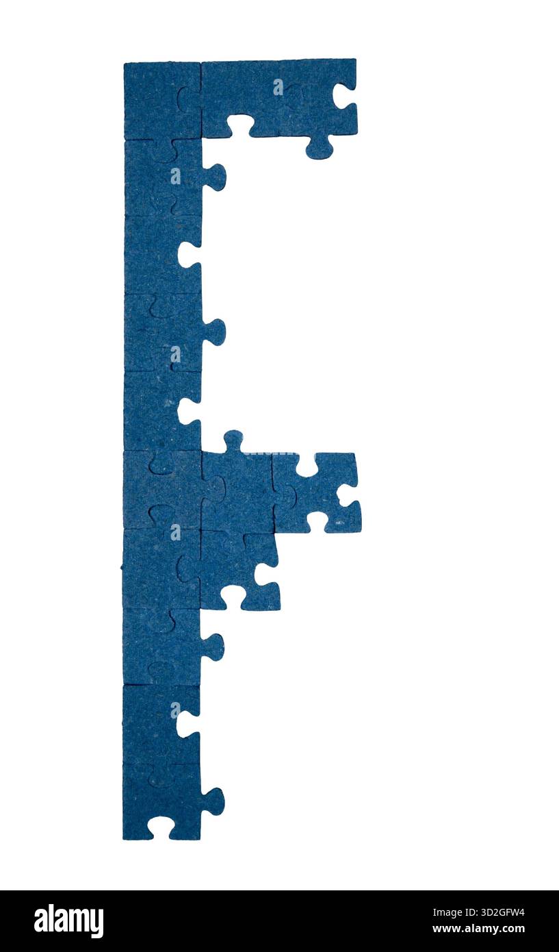 Un bordo della cornice fatto di pezzi del puzzle. parte dell'immagine del puzzle posizionata insieme. Inizio e concetto di pianificazione. Foto Stock
