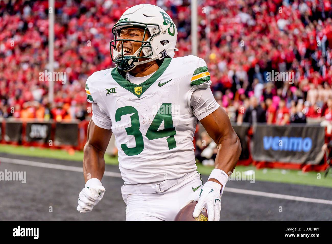 Il wide receiver dei Baylor Bears JOSH CAMERON (34) festeggia dopo aver fatto una presa nella end zone per un touchdown. Foto Stock