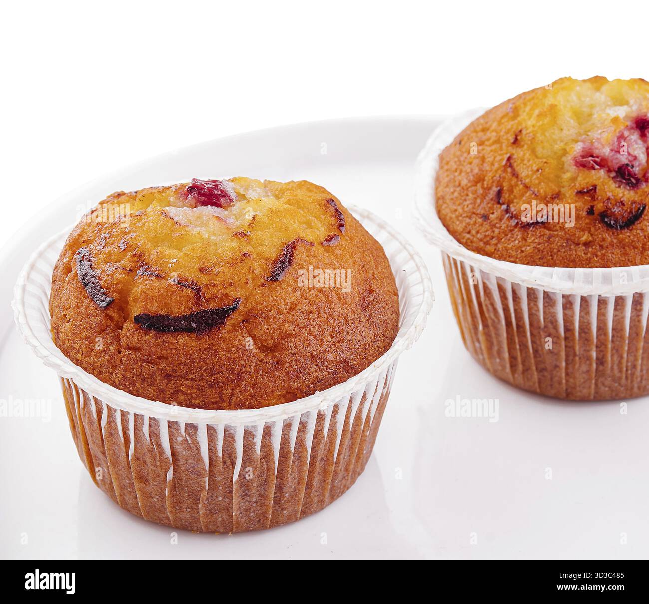 Cibo, due cupcake di banana su piatto bianco Foto Stock