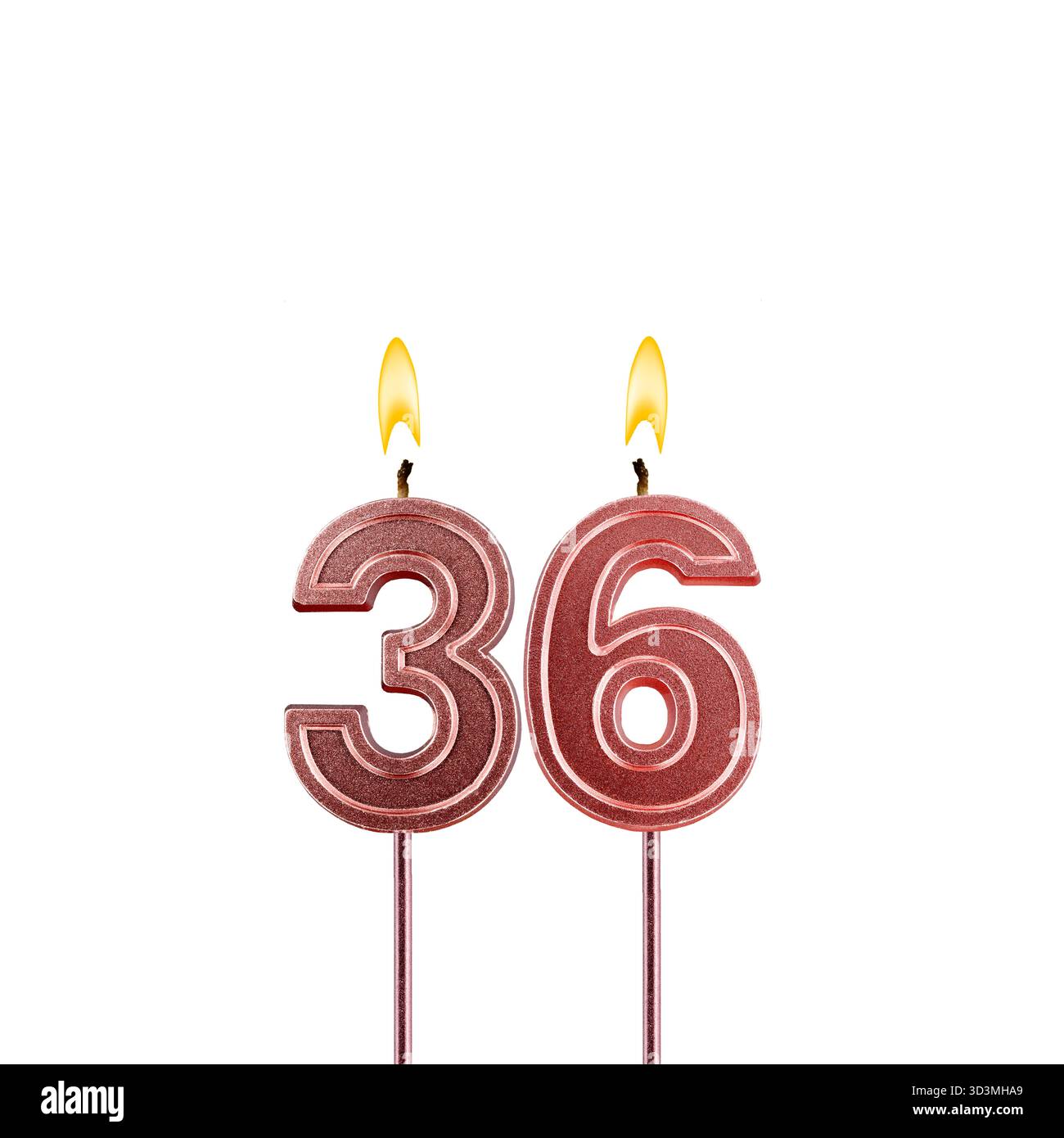 Candela numero 36 - candela di compleanno illuminata su sfondo bianco Foto Stock
