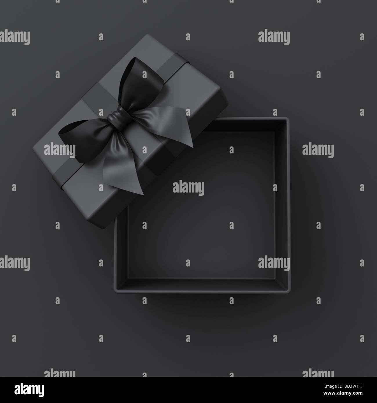 Scatola regalo nera vuota aperta o vista dall'alto della scatola regalo nera con nastri neri e arco isolato su sfondo scuro con ombre minime di truffa nera venerdì Foto Stock