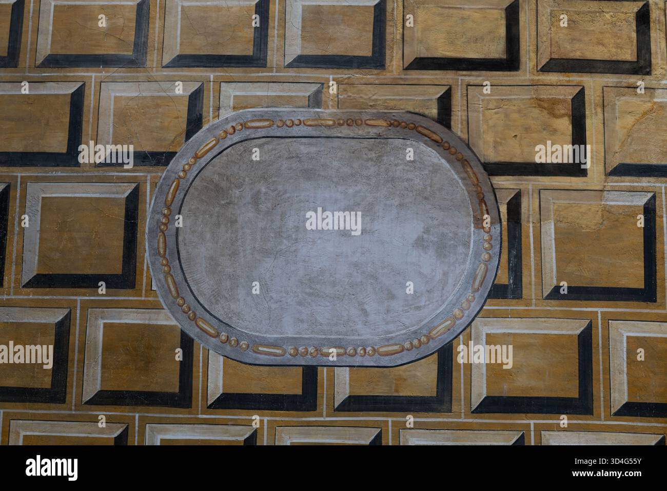 Una targhetta ovale, pronta per l'aggiunta di testo, su una parete dipinta con un motivo in mattoni. Repubblica Ceca. Foto Stock