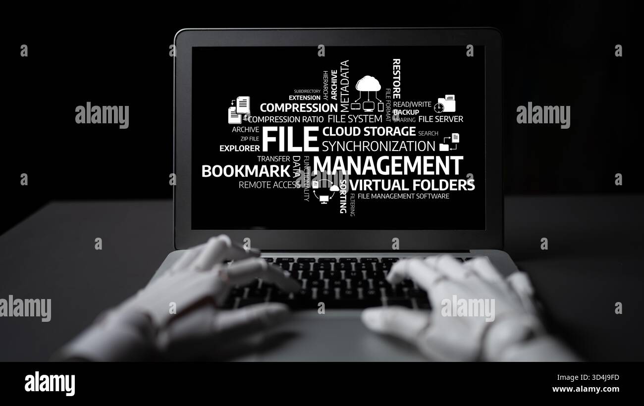 Una rappresentazione intrigante dei concetti di gestione dei file con un laptop e grafica per parole chiave. Ideale per mostrare tecnologia e digitale Foto Stock