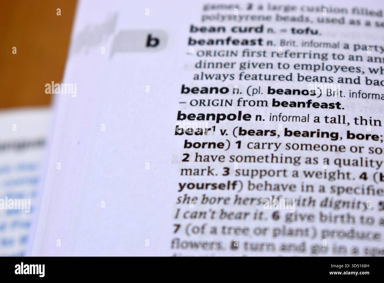 Pagina del dizionario inglese primo piano con la parola di -beano Foto Stock