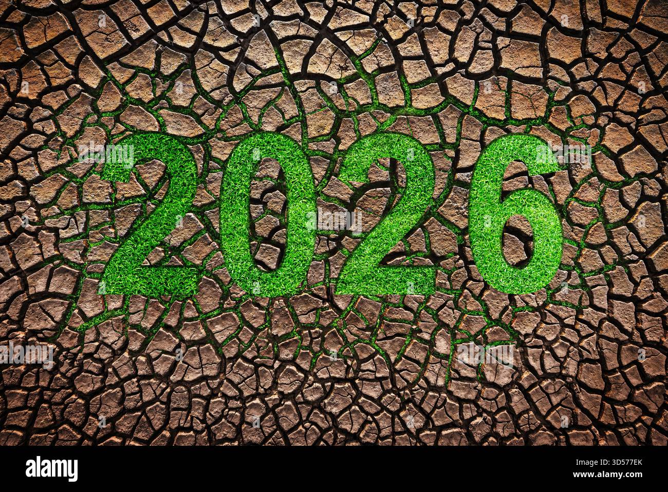 Trama Terra crepata con testo per il nuovo anno 2026, concetto di ambiente verde, cambiamento, futuro, crescita e nuova vita Foto Stock
