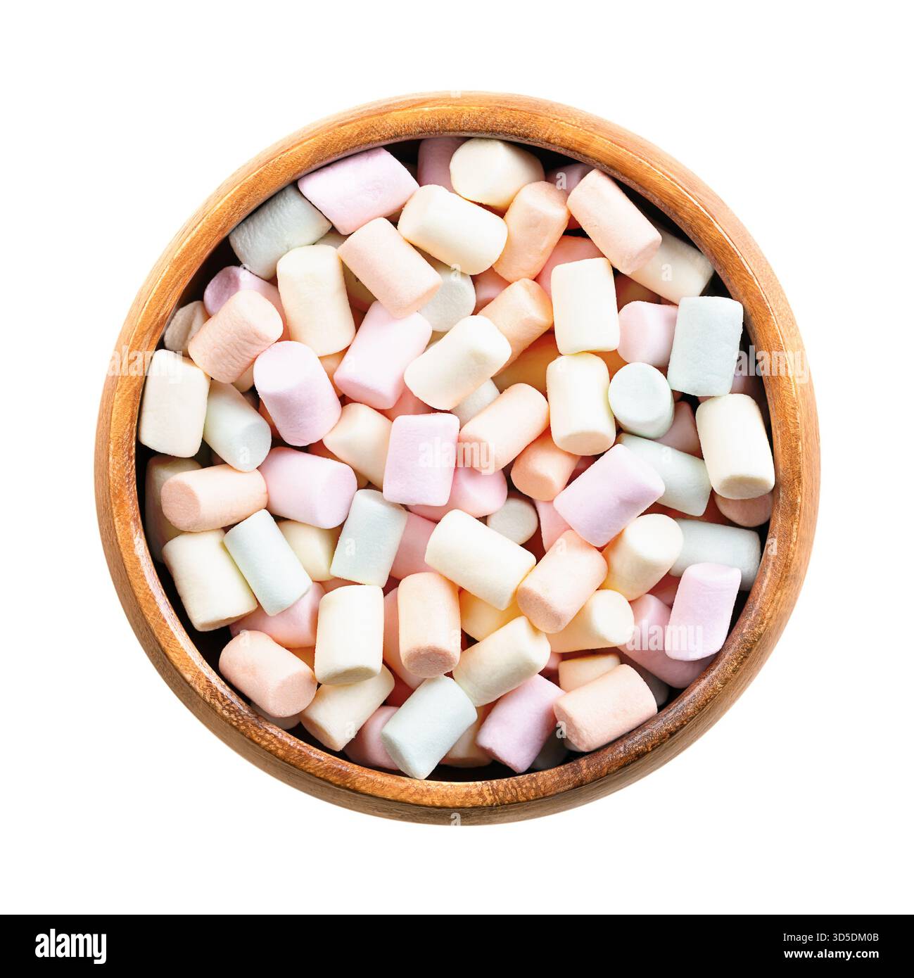 Mini marshmallow multicolore, in recipiente di legno. Pezzetti di dolciumi color pastello a base di zucchero, acqua e gelatina. Foto Stock