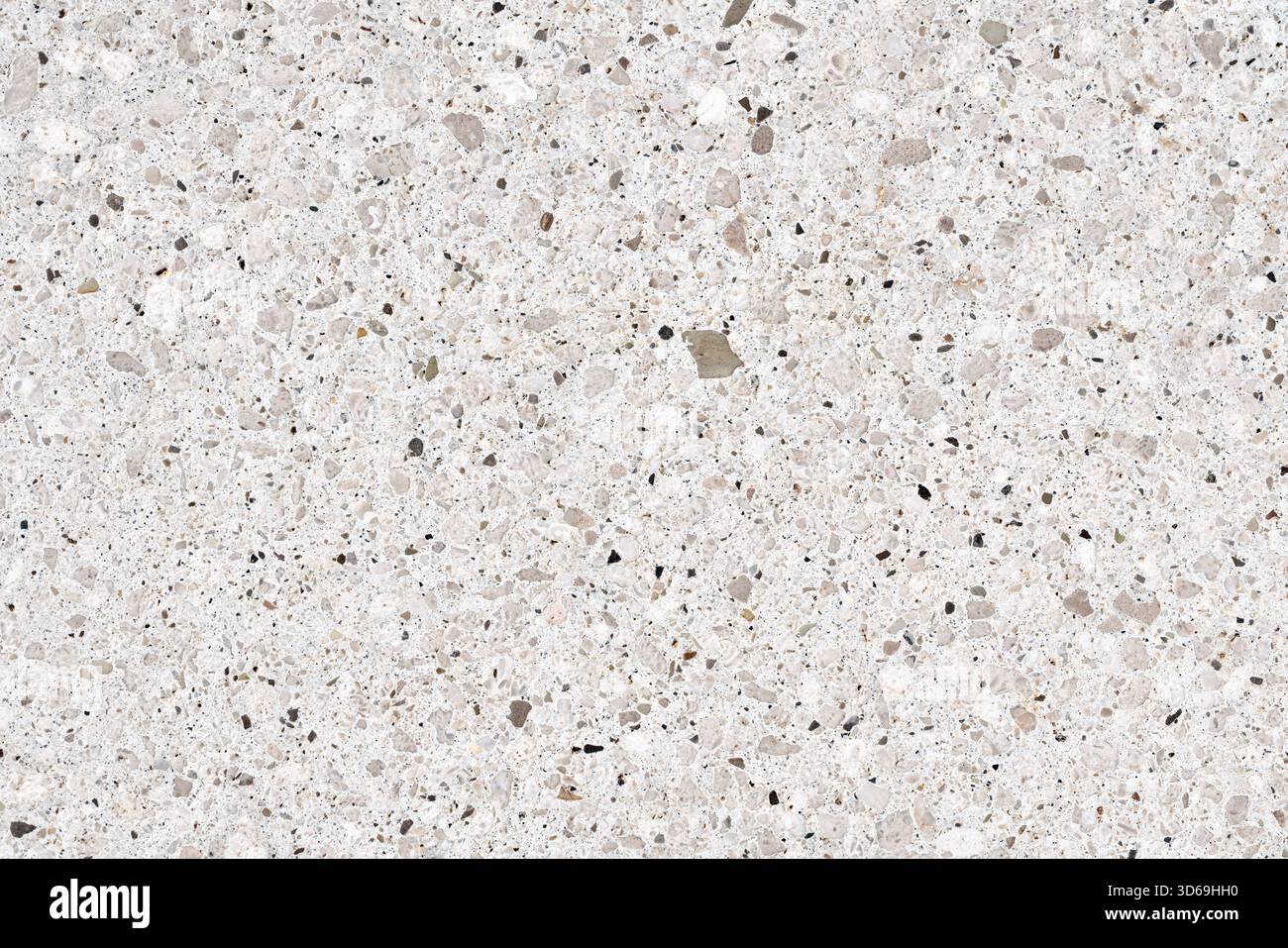 Texture senza cuciture ad alta risoluzione di pietra composita grigio chiaro, probabile terrazzo o quarzo. Presenta piccoli ciottoli nelle sfumature di grigio, nero e beige. Foto Stock