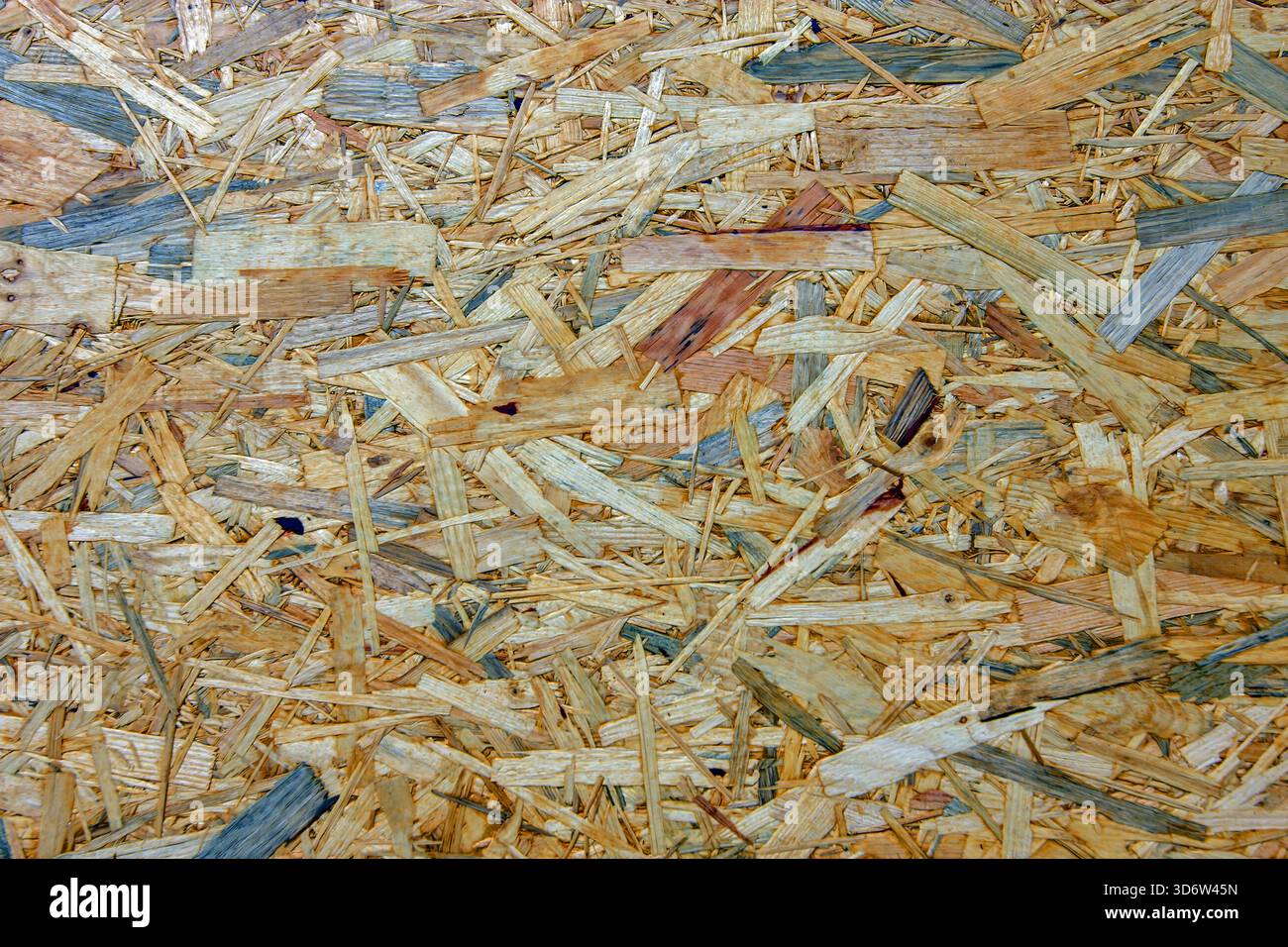 L'immagine è un primo piano di un OSB orientato Strand Board o di un pannello simile in legno composito Foto Stock
