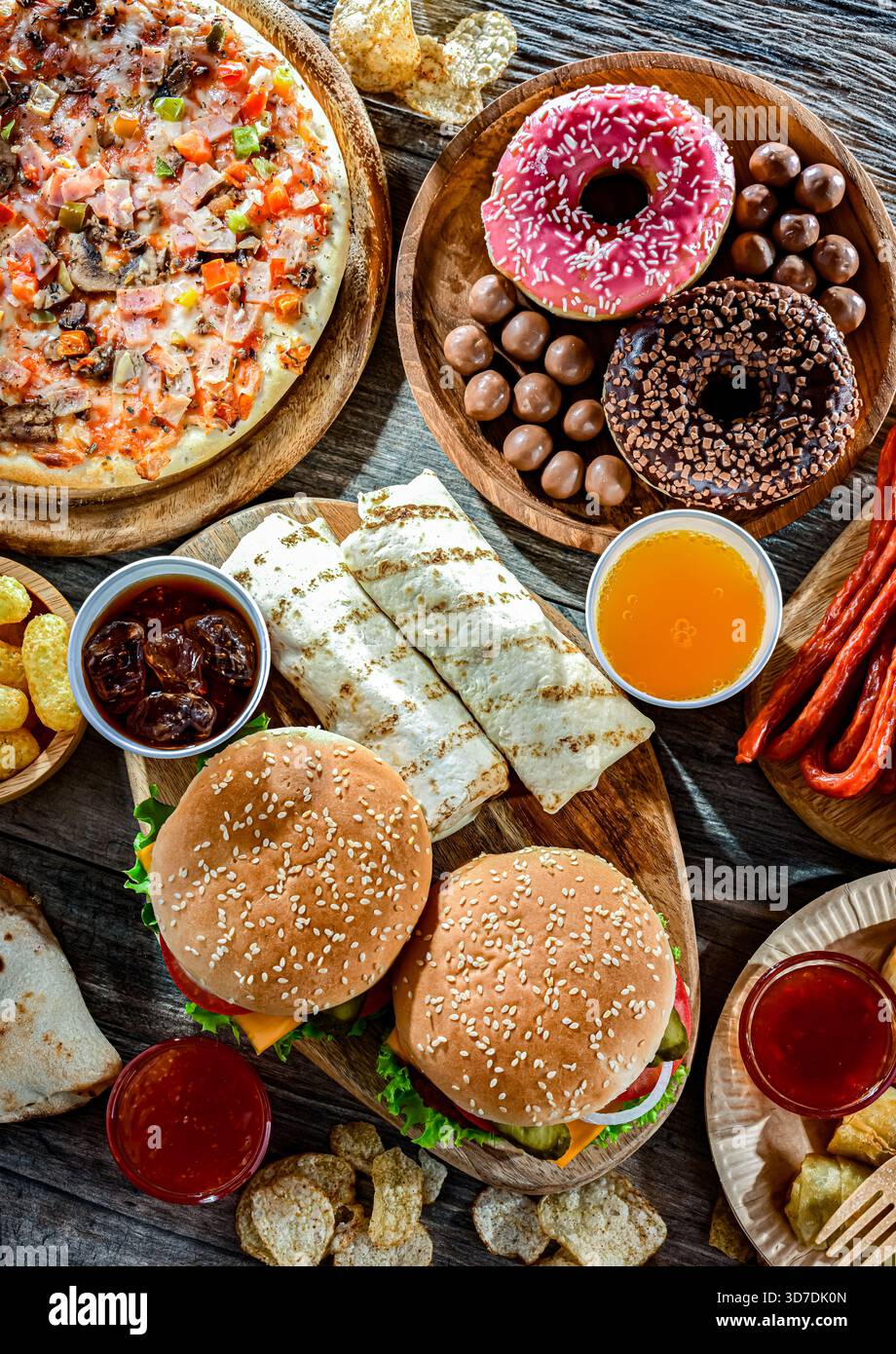Alimenti che aumentano il rischio di cancro. Cibo spazzatura. Foto Stock