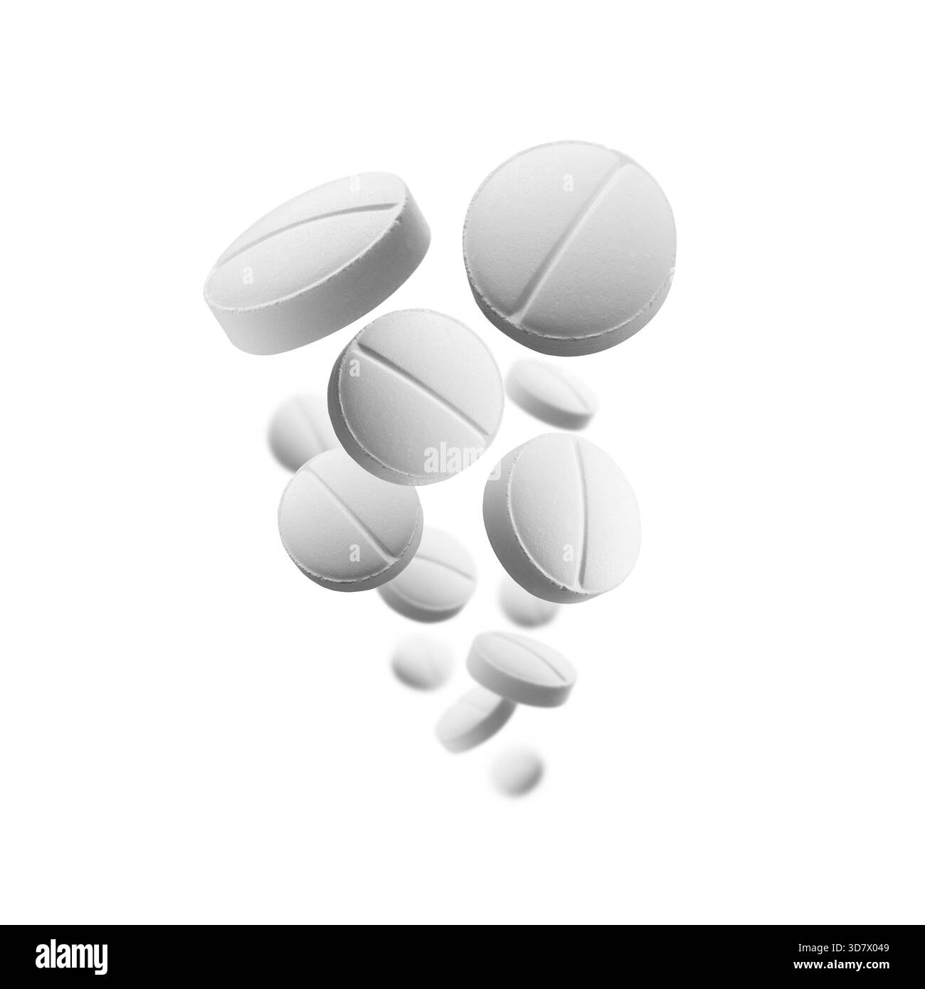 Le compresse rotonde bianche si levitano su sfondo bianco. Foto Stock