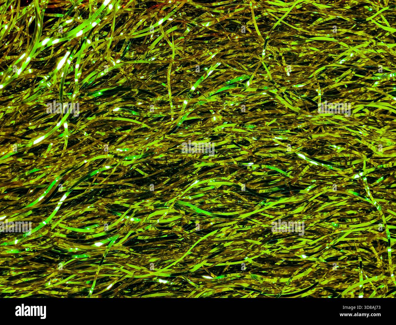 Texture a cavalletto metallizzata oro verde sfondo astratto decorazione natalizia brillante motivo a lamina per feste natalizie scintillante Foto Stock