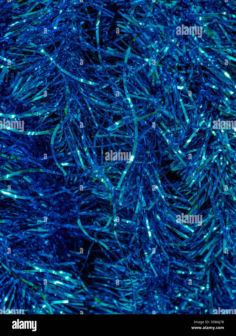 Texture color turchese blu con motivo a forma di selce sfondo astratto brillante e iridescente decorazione natalizia Foil scintillante Foto Stock